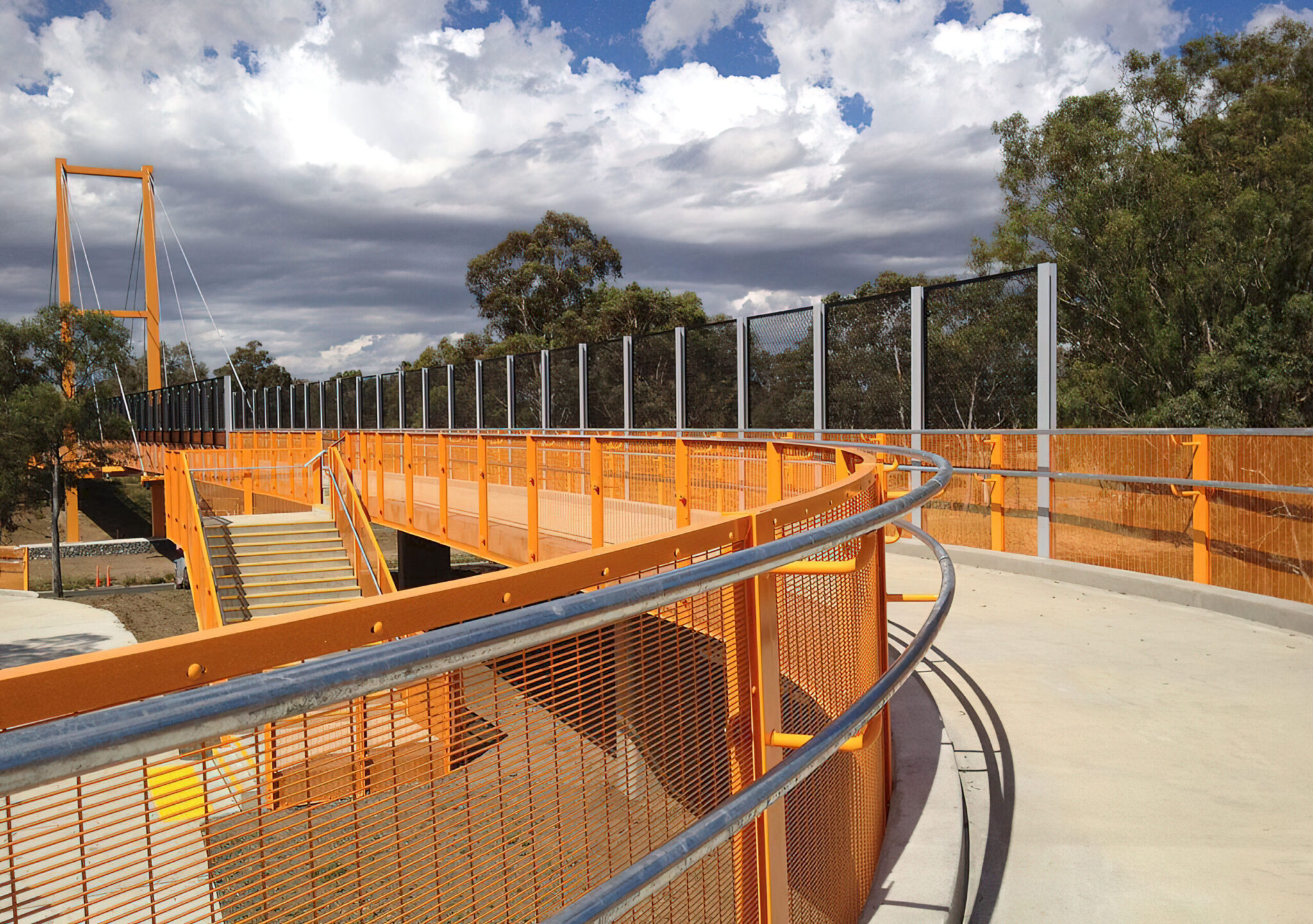 RJL Commercial Fencing and Gates — Anti-throw mesh screening to a pedestrian bridge, government infrastructure project