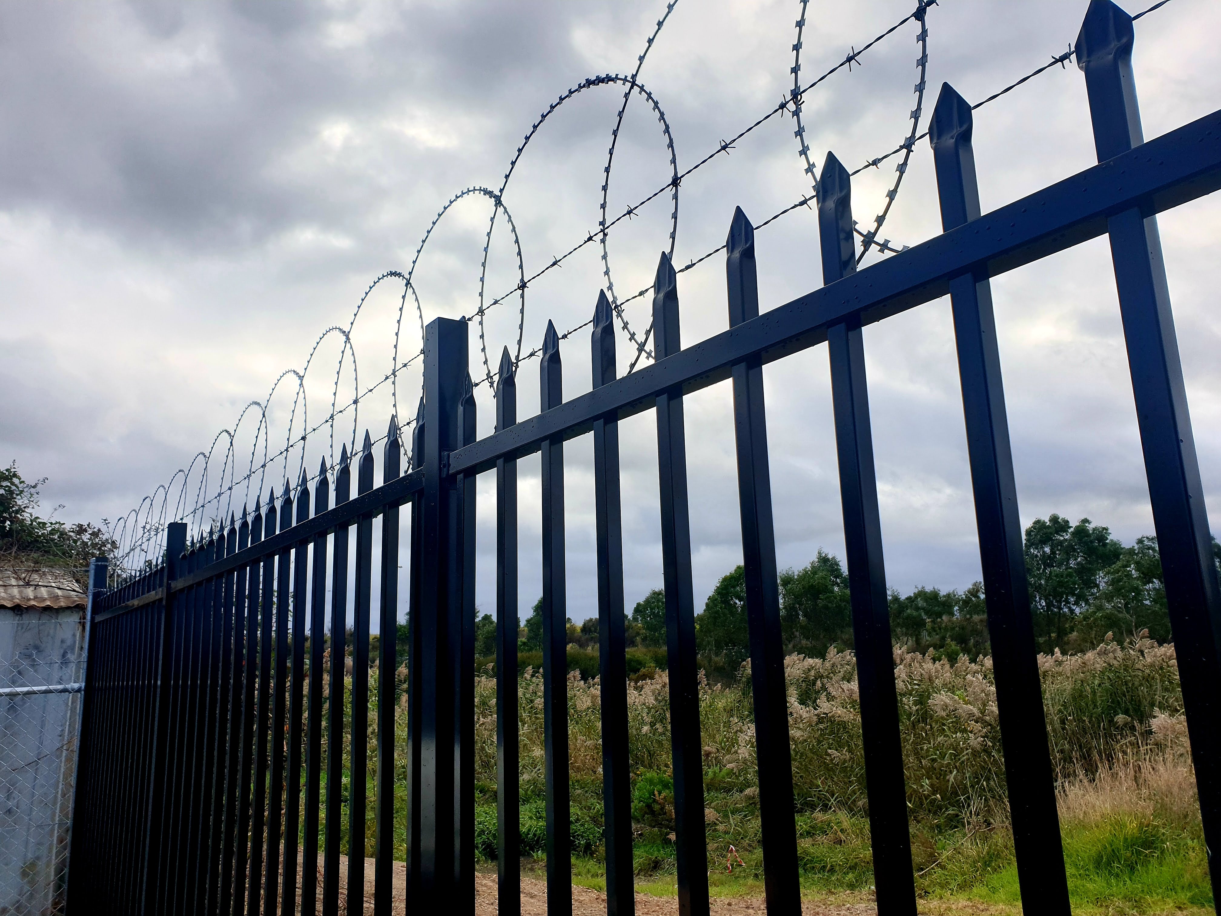 RJL Commercial Fencing and Gates — Automated sliding palisade gate with motor installed