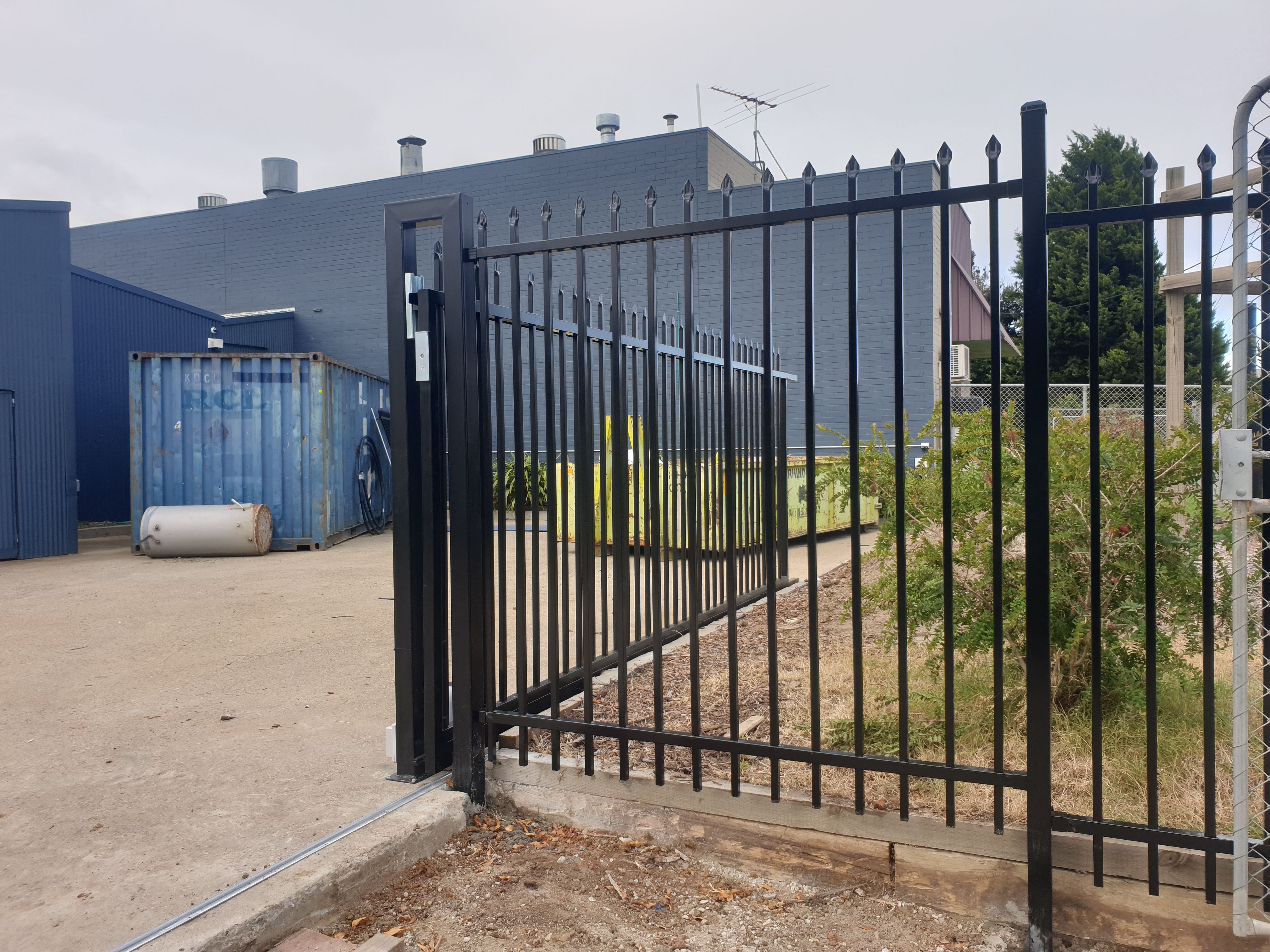 RJL Commercial Fencing and Gates — Barbed-wire topped chain mesh security fence